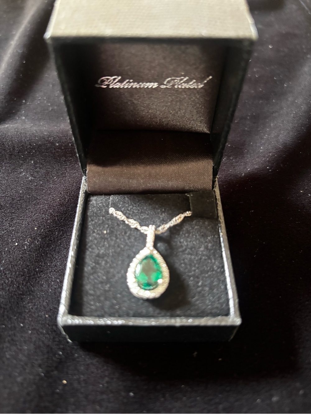 Green Teardrop Pendant Necklace. 16-20” platinum plated chain.
